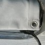 Detailaufnahme: Floracord Balkonverkleidung, silbergrau, mit Öse und Reißverschluss in Verpackung.