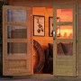 Offene Doppeltür des unbehandelten Karibu Holz-Gartenhauses Kumla 7 mit Pultdach.