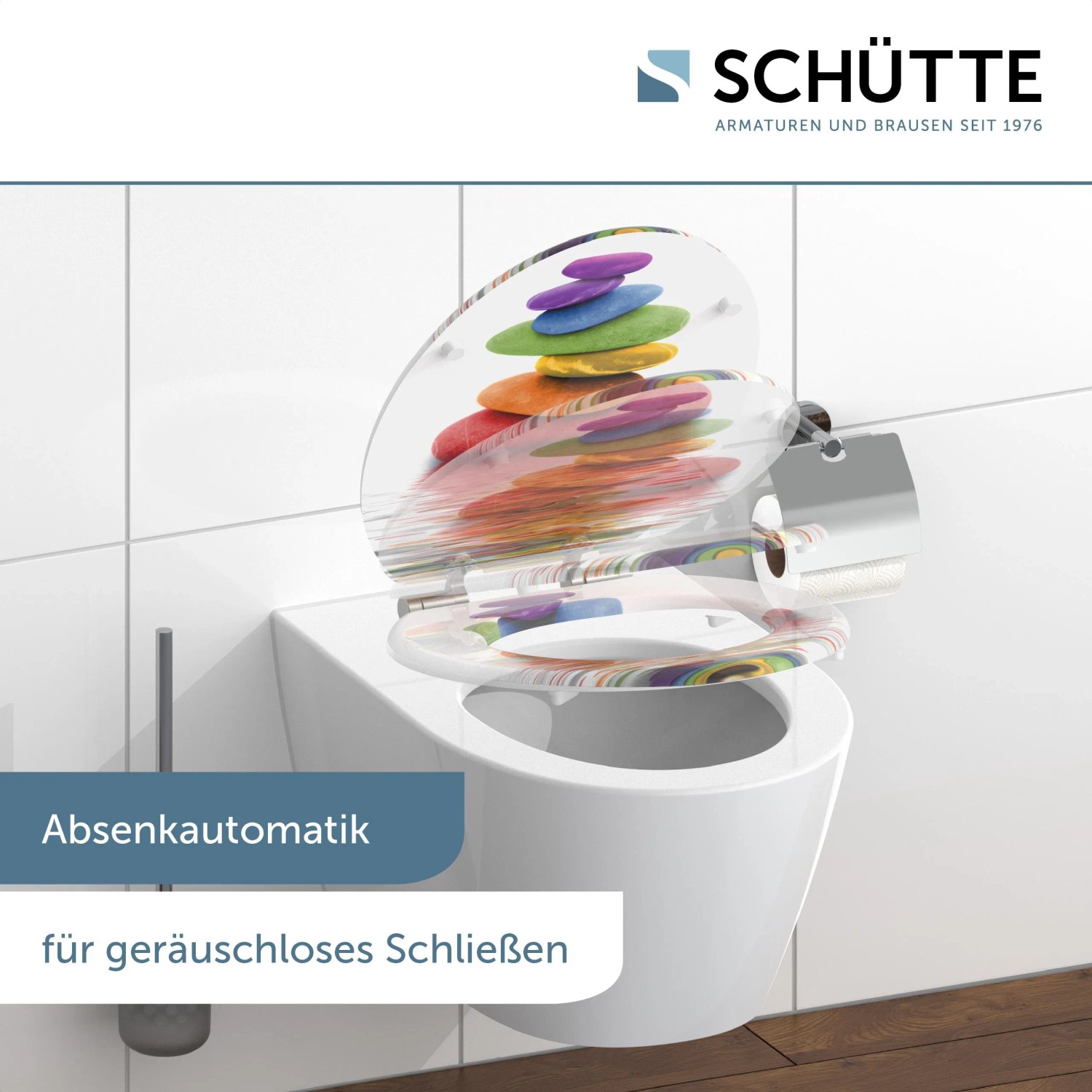Schütte WC-Sitz Colorful Stones mit Absenkautomatik auf WC-Becken. Buntes Steine-Motiv.