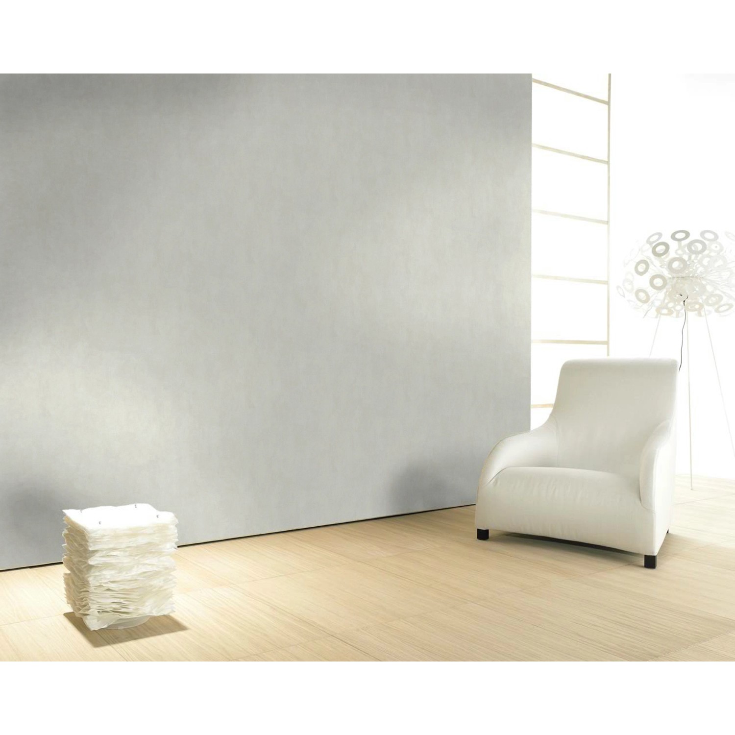 Beige Vliestapete Nabucco mit Putzstruktur im Vintage-Look an einer Wand im Wohnraum.