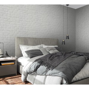 Moderne Vliestapete in Steinoptik (Greige) von Marburg im Schlafzimmer.