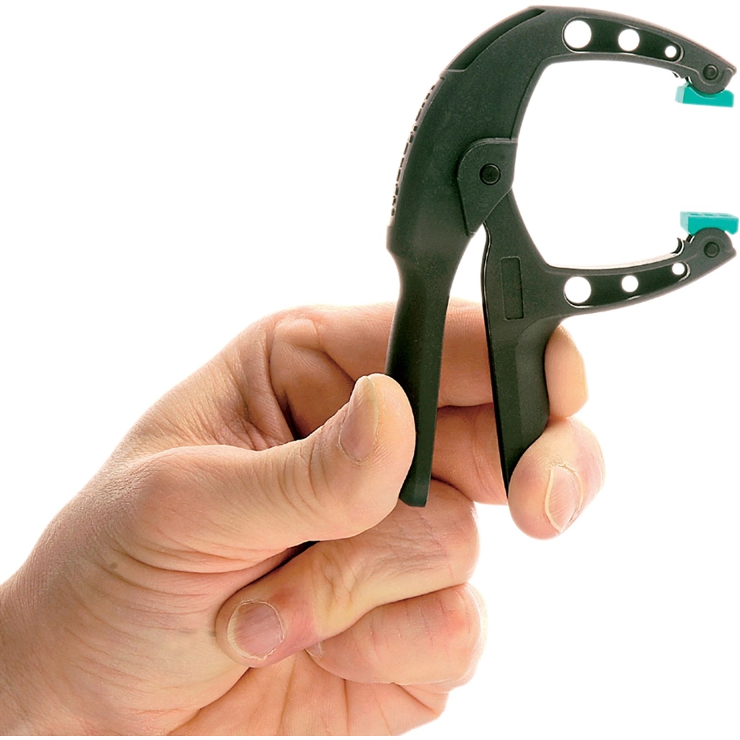 Hand hält wolfcraft Ergo-Federzwinge FZH 3 cm, Spannwerkzeug mit beweglichen Spannbacken.