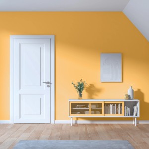Wohnraum mit Wandfarbe in Hafergelb (Tilda) von CREATE! by OBI. Matte Oberfläche, gemütliche Atmosphäre.