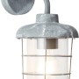 Graue Brilliant Außen-Wandlampe Carlisle im Beton-Look mit klarem Glas und Metallgitter.