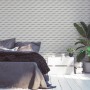 Vliestapete mit 3D-Effekt, geometrisches Muster in Weiß und Grau, matte Oberfläche.