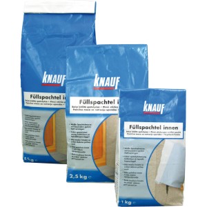 Drei blaue Säcke Knauf Füllspachtel Innen in verschiedenen Größen (1kg, 2,5kg, 5kg).