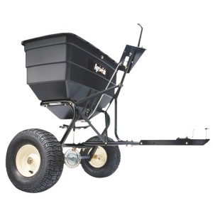 MTD Universal Anhänge-Streuer (max. 80 kg) für Rasentraktoren, mit zwei Rädern und schwarzem Behälter.