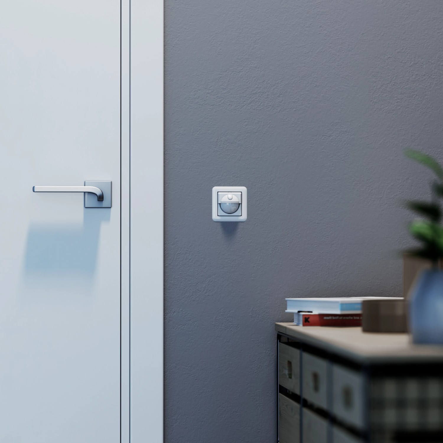 Steinel Bewegungsmelder IR180 UPeasy, Einbaugerät für 2- und 3-Draht-Installation an grauer Wand.