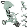 Globber Explorer Trike 4in1 Kinderfahrzeug in Pistazie. Zeigt Kinderwagen, Dreirad und Laufrad Konfigurationen.