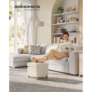 Cremefarbener Songmics Sitzhocker Melisa (32x40 cm) mit Stauraum im Wohnzimmer.