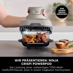 Ninja Glas-Heißluftfritteuse FN101EUST CRISPi 4-in-1 mit Speisen im Glasbehälter.