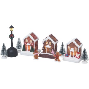 Beleuchtetes LED-Weihnachtsdorf Lebkuchen mit Häusern, Figuren und Laterne als Weihnachtsdekoration.