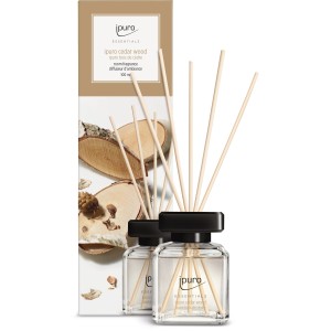 ipuro ESSENTIALS Raumduft Cedar Wood 100ml mit Duftstäbchen und Verpackung.