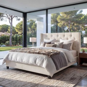 Beige Polsterbett 180x200 cm mit Lattenrost und Stoffbezug im Schlafzimmer.