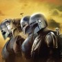 Komar Wandbild Star Wars The Mandalorian, 50x70 cm, gelber Hintergrund, zeigt vier Mandalorianer.