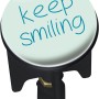 Wenko Waschbeckenstöpsel Pluggy Keep Smiling mit blauem Schriftzug auf hellem Grund.