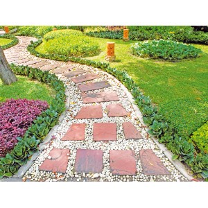 Gartenweg mit Heissner Unkrautvlies unter Steinen und Pflanzen. Unkraut Stop.