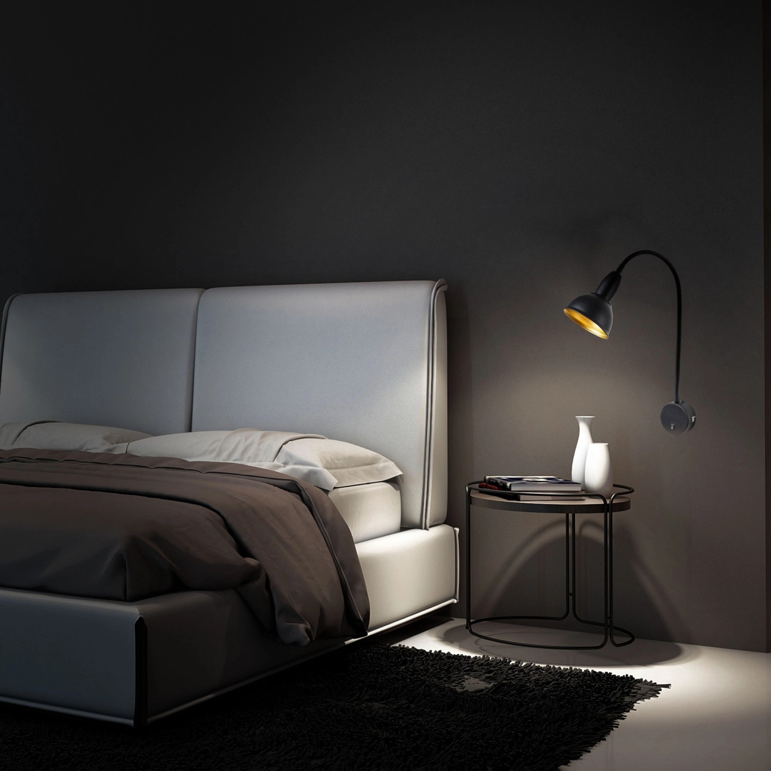 Wandlampe Briloner Bettleuchte Hygge, schwarz-gold, mit Flexarm als Leselampe am Bett.
