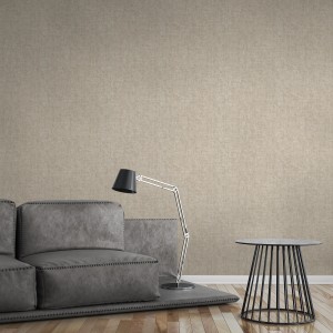 A.S. Création Vliestapete Greenery Uni hellbraun metallic an Wohnzimmerwand.