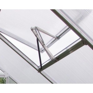 Automatischer Fensterheber von KGT für Frühbeete, montiert im Gewächshaus.