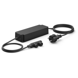 Schwarzes Philips Hue Outdoor Netzteil (100W) mit Kabel und Stecker für Außenleuchten.