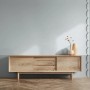 Wohnraum mit grauer Marburg Bordüre Shades Iconic 12 mit grafischem Muster.