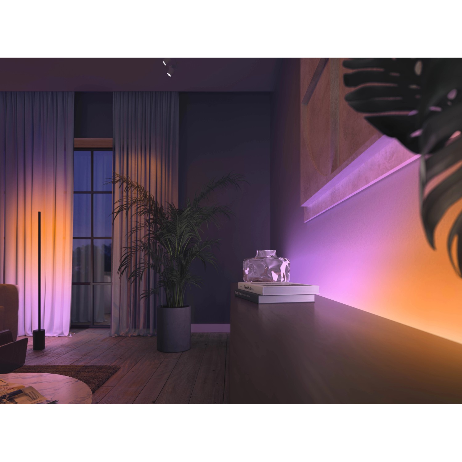 Philips Hue Lightstrip Gradient Ambiente, 1m Erweiterung im Wohnzimmer mit Farbverlauf.