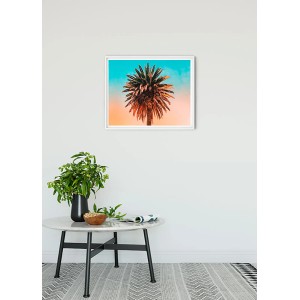 Komar Wandbild Palm Tree, 70x50 cm. Dekoratives Bild einer Palme vor blau-orangem Himmel.
