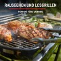 Weber Traveler Camping-Gasgrill: Steaks und Spargel auf dem Grillrost. Perfekt für unterwegs.