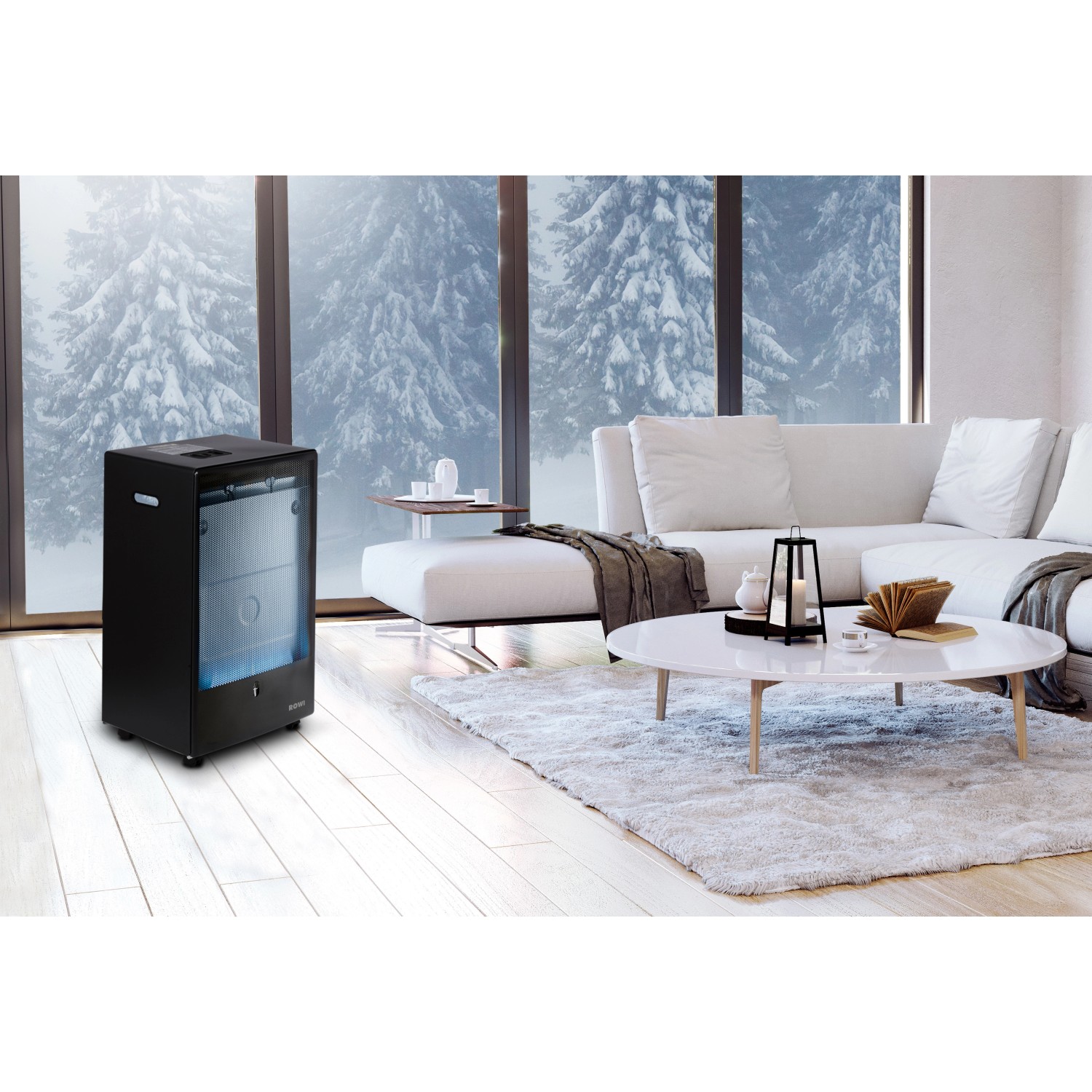Schwarzer Gas-Heizofen Blue Flame Eco Smart im Wohnraum mit Thermostat und Rollen.