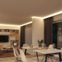 Wohnraum mit Paulmann LED-Strip SimpLED, warmweißes Licht an der Decke.