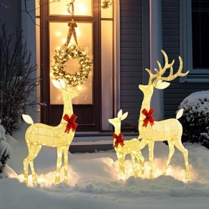 Leuchtende silberne LED Rentierfamilie mit roten Schleifen, Weihnachtsdekoration für den Außenbereich im Schnee.