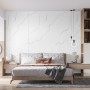 Helles Schlafzimmer mit weißer Kronoflooring Wandverkleidung Rock the Wall Statuario im Marmor-Look.