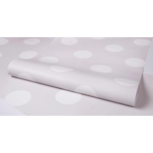 Vliestapete mit grauem Hintergrund und weißen Punkten von Graham & Brown.