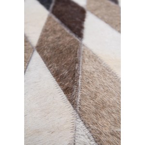Detailansicht des grauen Teppichs Wonder 710 (160x230 cm) aus Leder im Patchwork-Design.