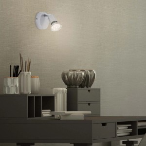 Brilo LED-Spot in Titan, 1-flammig, schwenkbar, warmweißes Licht, montiert an einer Wand über einem Schreibtisch.