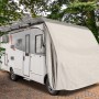 Wohnmobil-Schutzhülle (750x235x270cm) in Beige schützt vor Witterung und Schmutz.