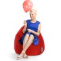 Frau sitzt entspannt im roten Sitting Point Sitzsack Easy 220 l mit Ballon.