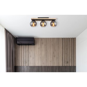 Globo Deckenleuchte mit 3 Rauchglas-Schirmen, schwarz-matte Halterung und Holzdetails.