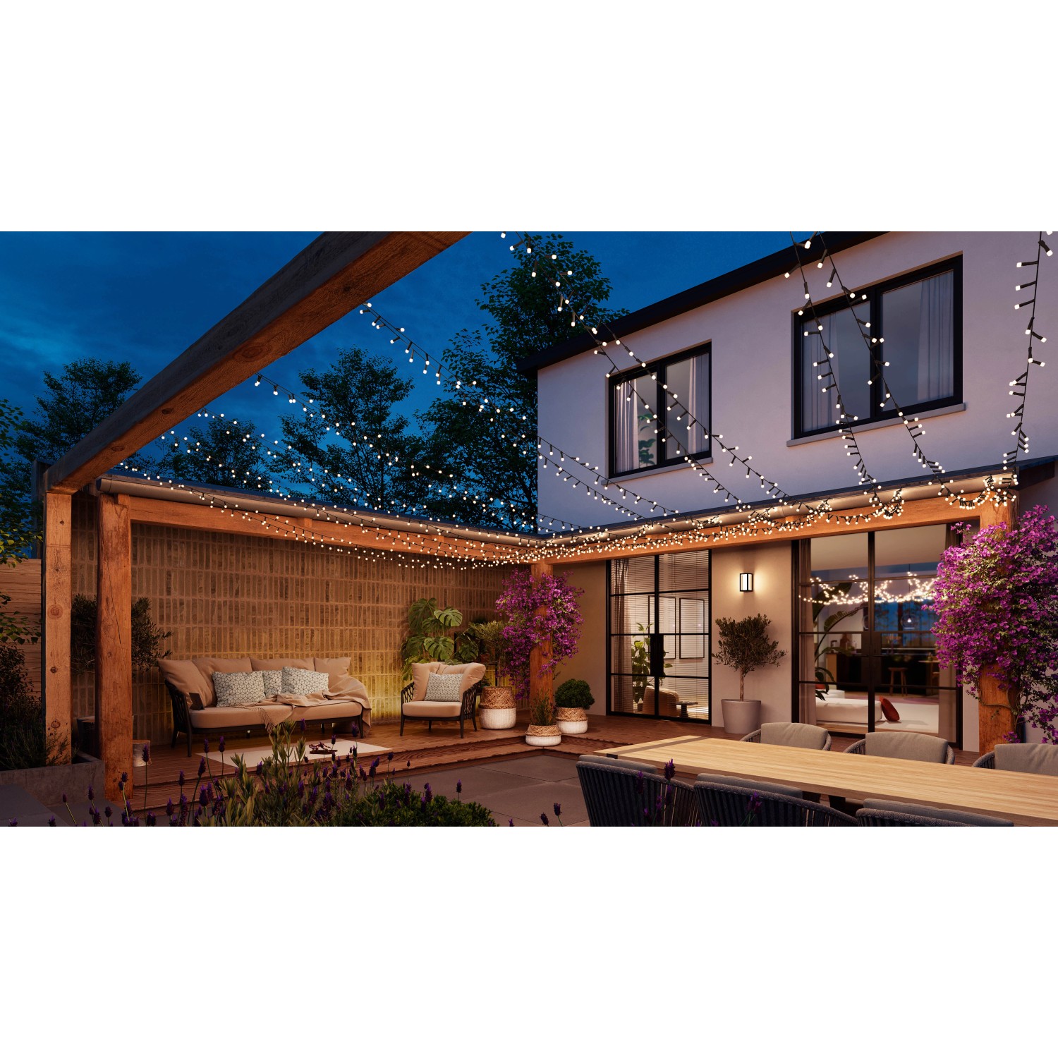 Philips Hue Festavia Lichterkette (20 m) mit 250 LEDs beleuchtet Terrasse und Pergola.