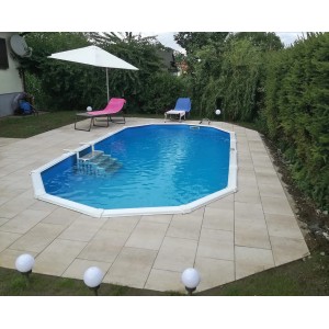 Ovaler Stahlwandpool Chemoform Protector T60 (515x390x60 cm) mit Poolumrandung im Garten.