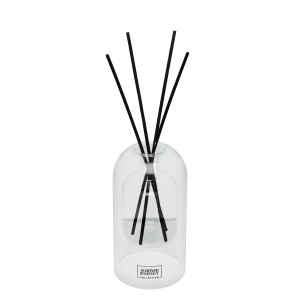 Schöner Wohnen Raumduft Lemongrass im Glas mit schwarzen Duftstäbchen.