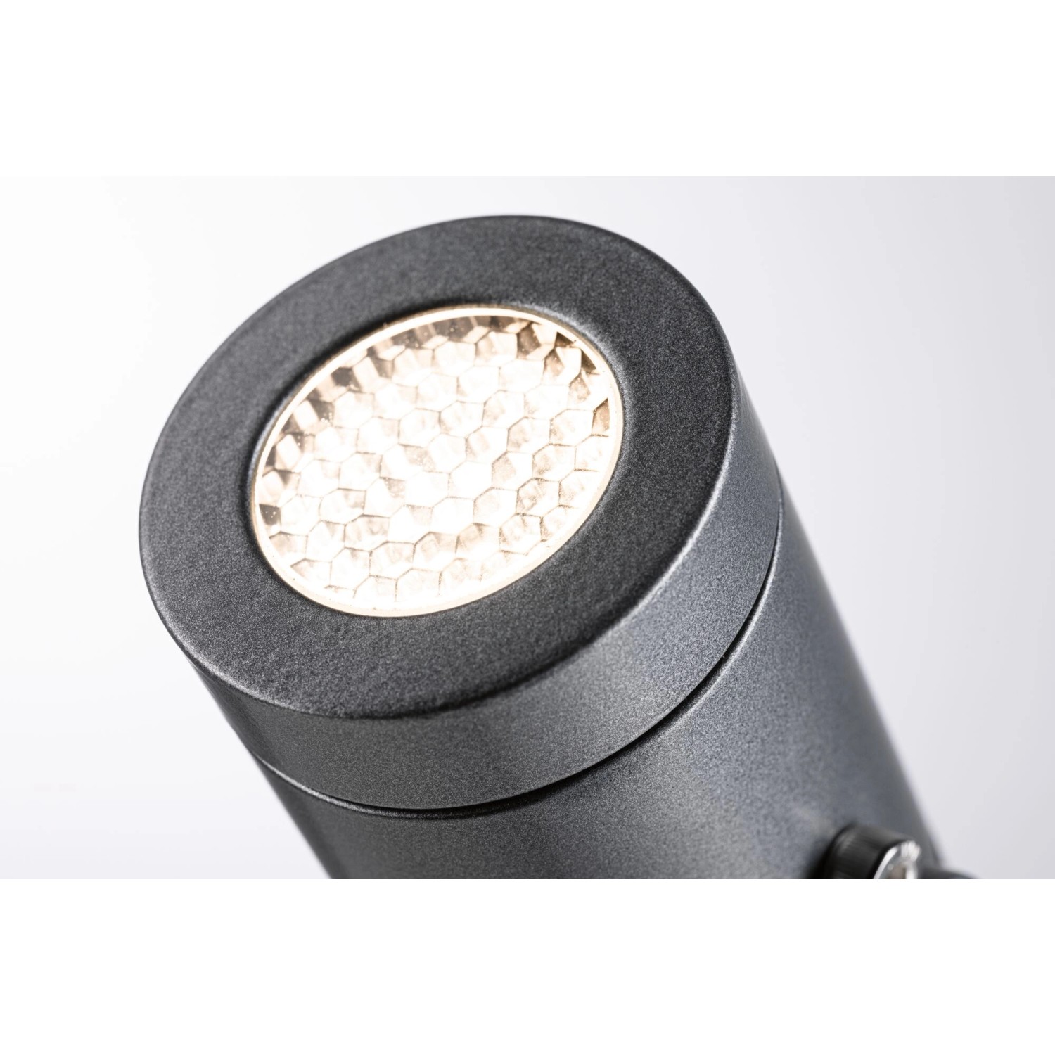 Grauer Paulmann LED-Gartenstrahler Plug & Shine Radix, 6W, 3000K, für Außenbeleuchtung.