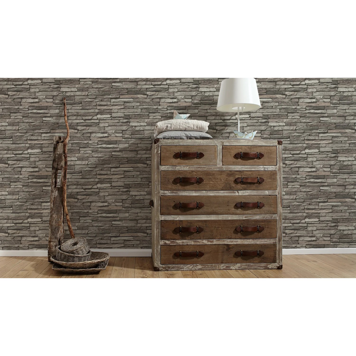 Graue A.S. Creation Vliestapete Dekora Natur 6 mit Steinmuster an der Wand.