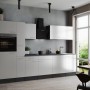 Weiße Respekta Küchenzeile Oliver 310 cm mit Elektrogeräten und Arbeitsplatte in Granitoptik.