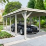 Grau tauchgrundierter Palmako Einzelcarport Karl mit Auto im Garten.